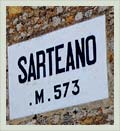 Wall sign entering Sarteano